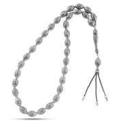 999 silver prayer bead with oval-shaped beads engraved with a precise geometric pattern
