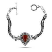 The Tear-shaped bracelet, 925 Egyptian silver, crowned with an agate stone