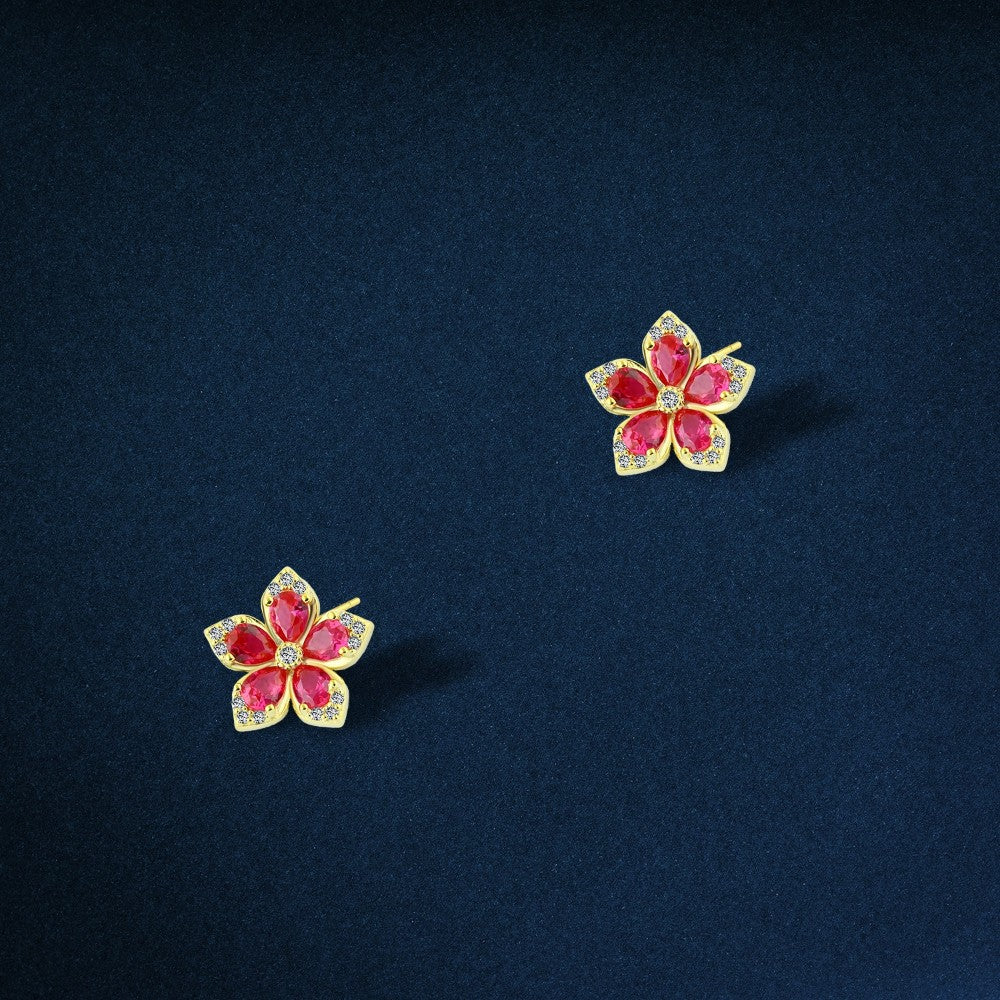 925 sterling silver earring featuring a flower design, adorned with pink zircon stones
