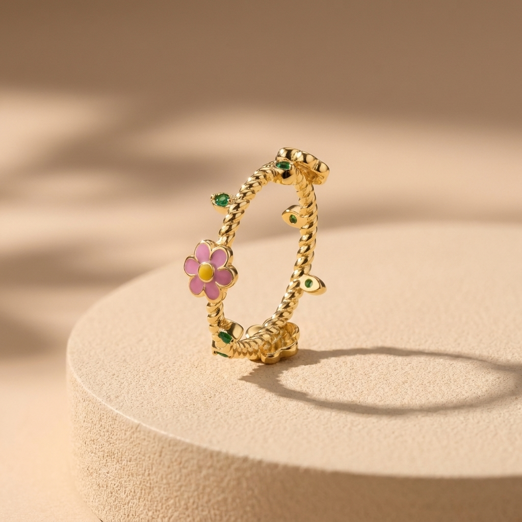 Gold-Plated Women’s Ring with Small Pink Flower Design and Playful Green Details