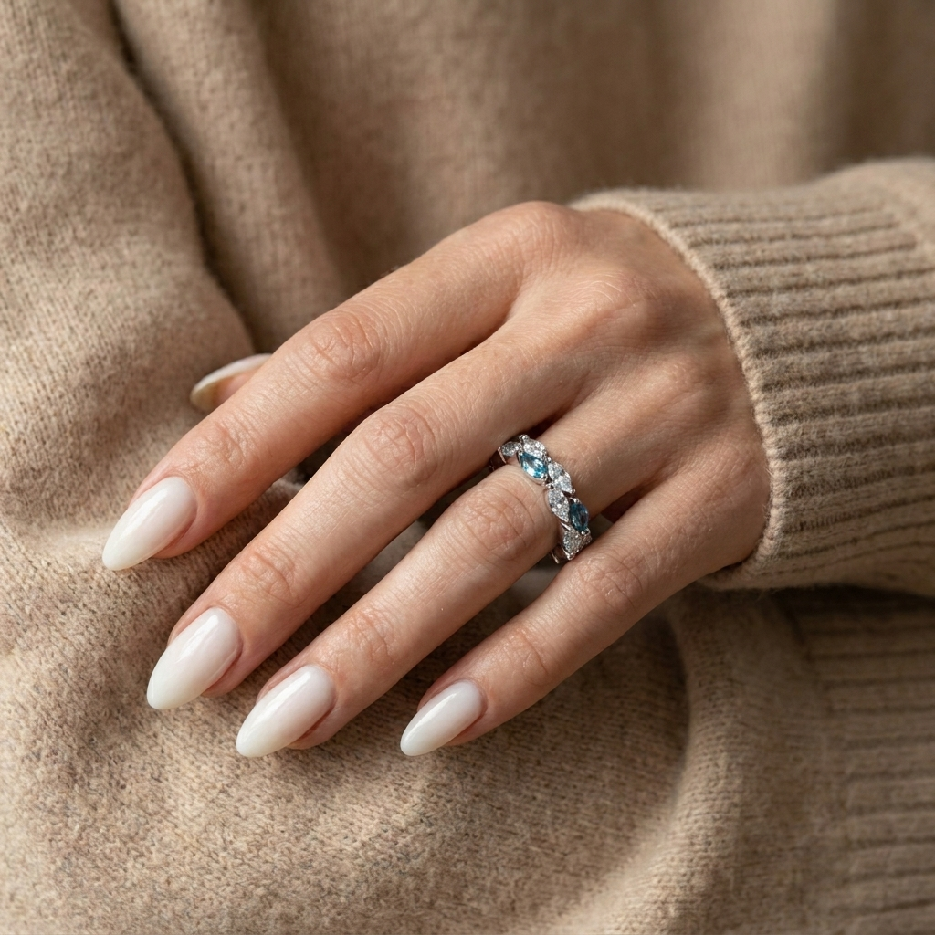 925 Silver Ring Adorned with Sparkling Blue Stones