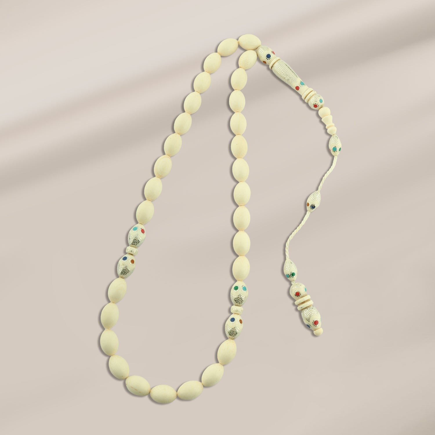 سبحة من العاج سن فيل بطقم فضة وأحجار فيروز وملاكيت ومرجان ولابيس وكهرمان – TROS01-50I