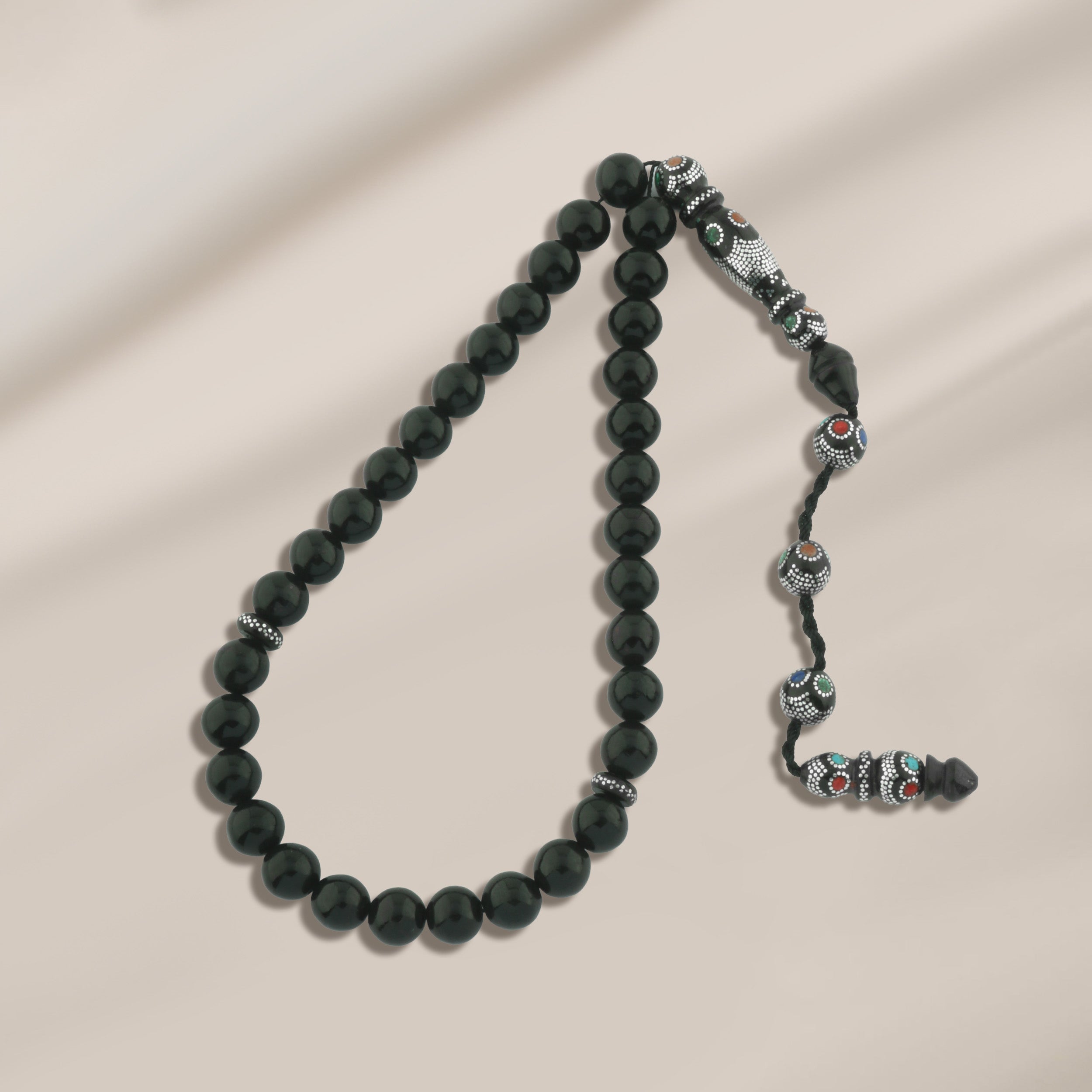 سبحة فاخرة من يسر البحر الأحمر مع الفيروز والكهرمان و ملاكيت مطعمه فضه عيار 999