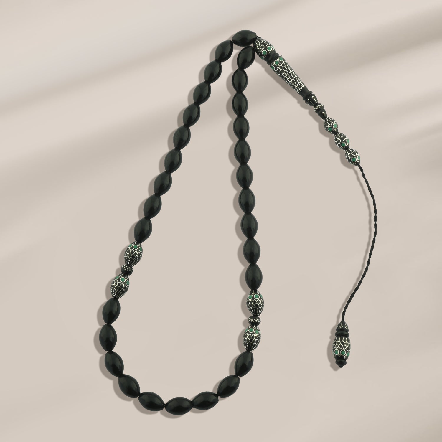 سبحة "سمراء " كوك لوكس 8 مم شكل زيتونة بطقم فضة 999 مطعّم ملاكيت WROS02-G