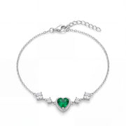 925 silver bracelet with a shiny green heart.