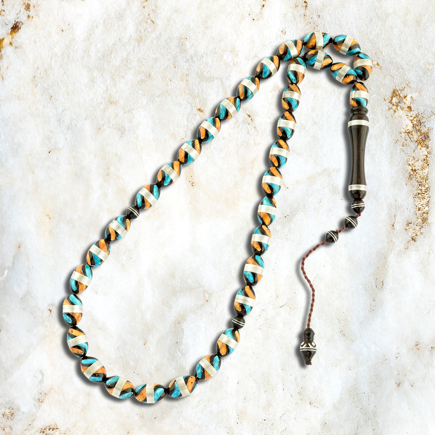 سبحة فضة عيار 999 بتصميم كهرماني أنيق للجنسين