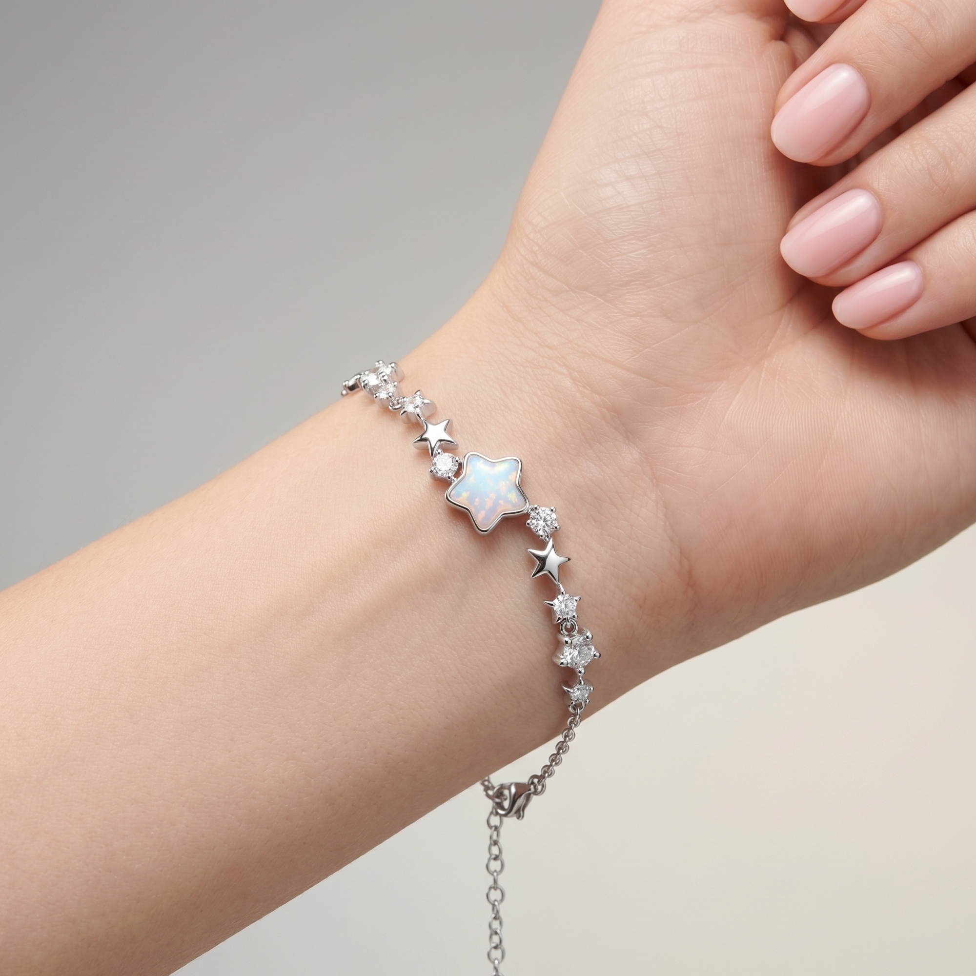 925 silver bracelet with a star design and a shimmering opal stone.
