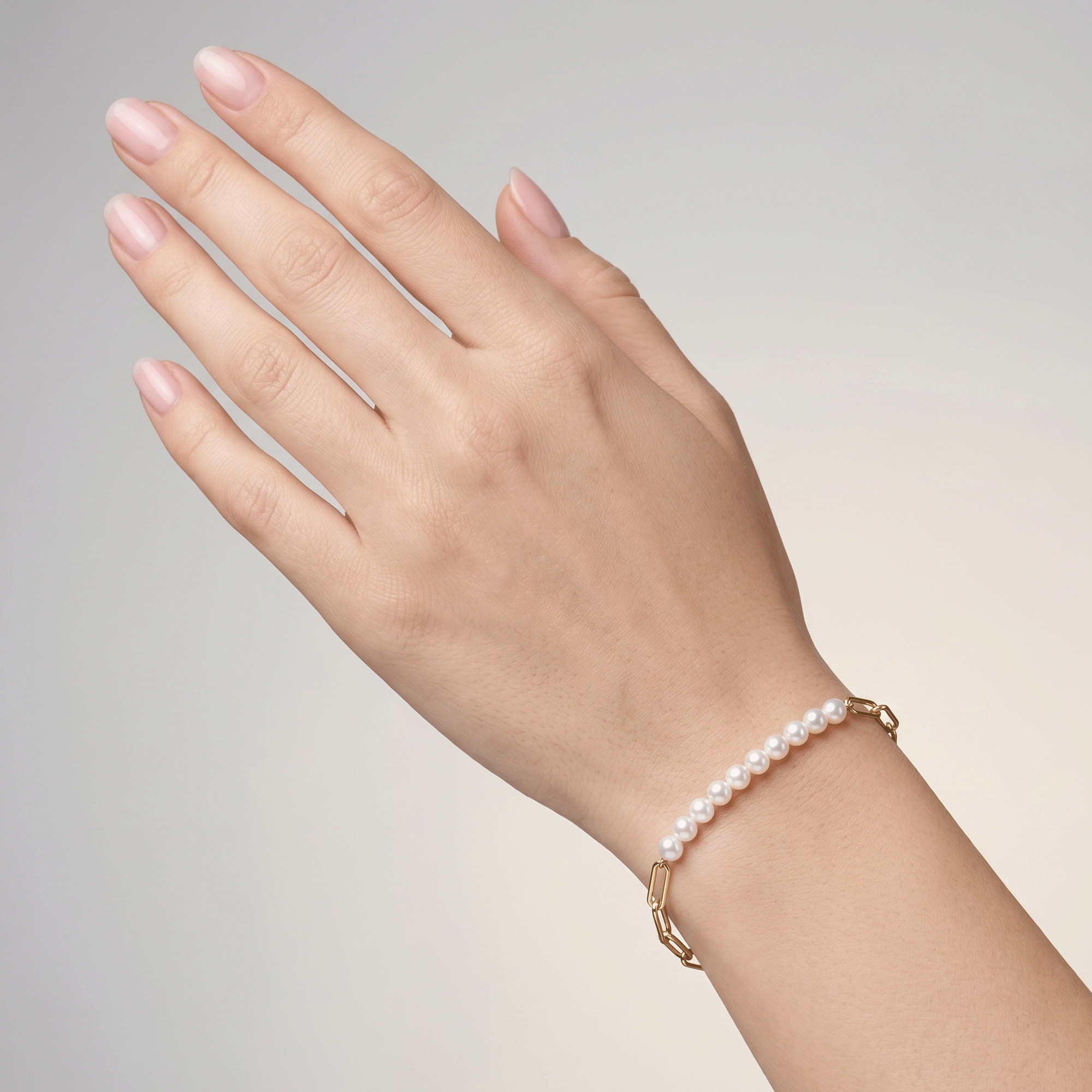 925 silver gold-plated bracelet with a chain and pearls.