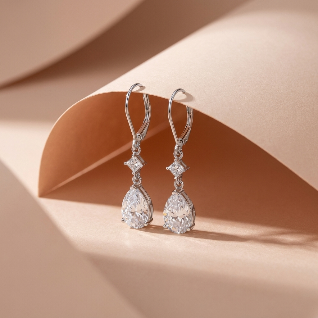 925 Silver Earrings With A Sparkling Teardrop Stone And Elegant Details.