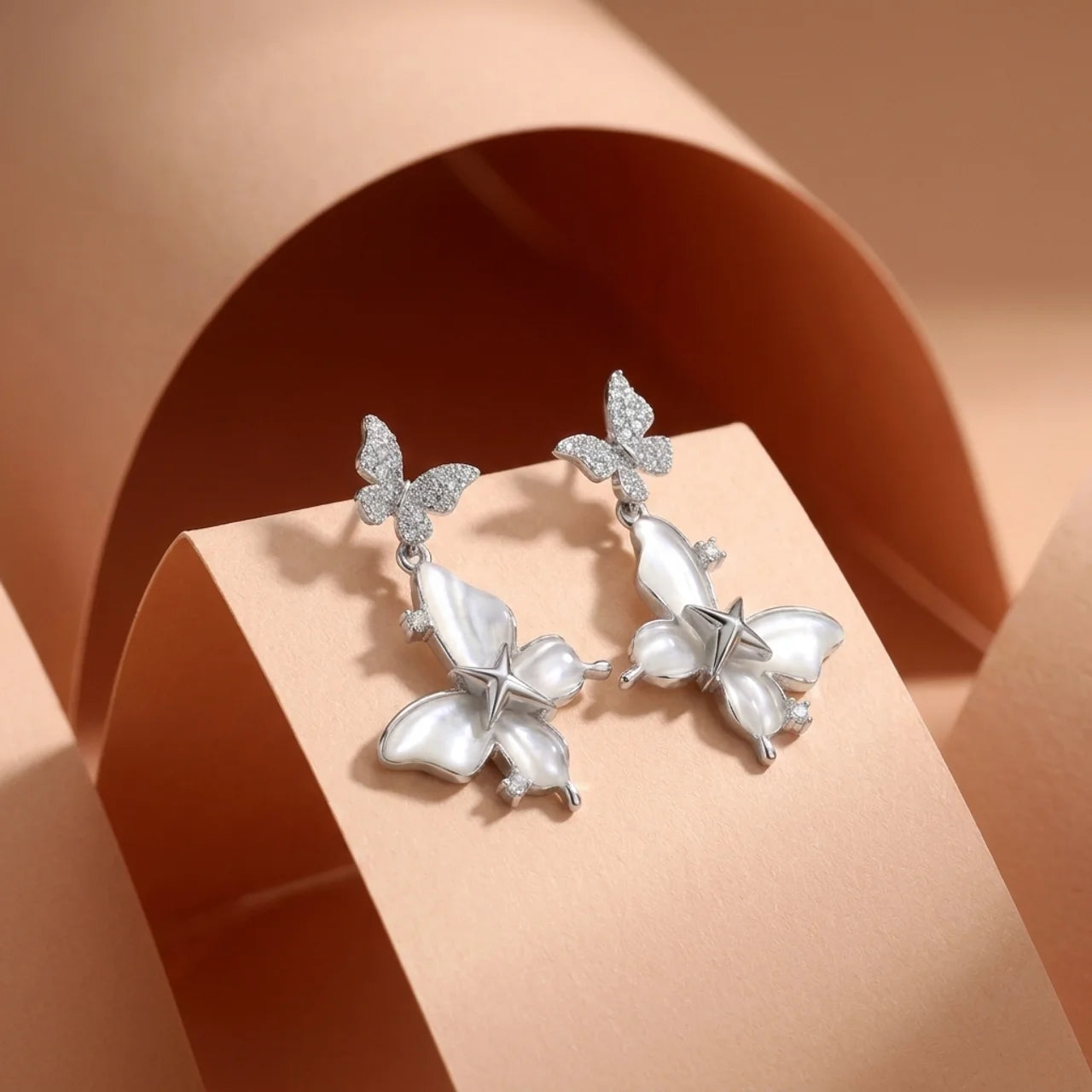 925 Silver Shimmering Butterfly Earrings with Natural Mother-of-Pearl Stone