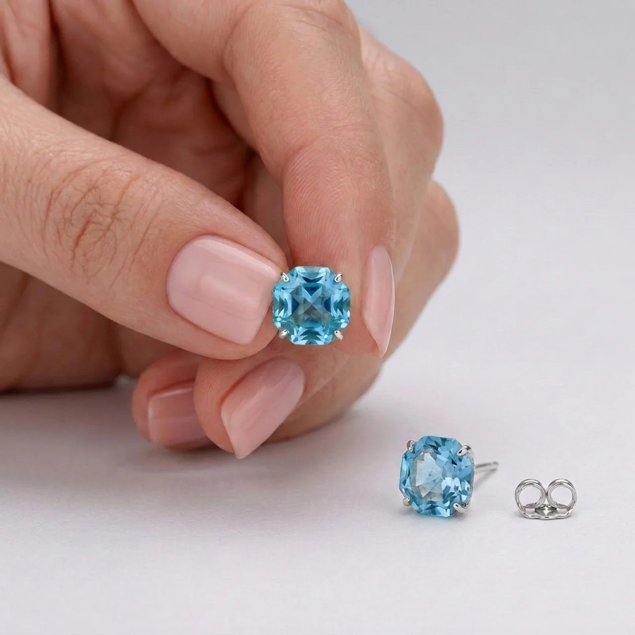 925 Silver Earrings with a Geometric-Cut Blue Stone Design