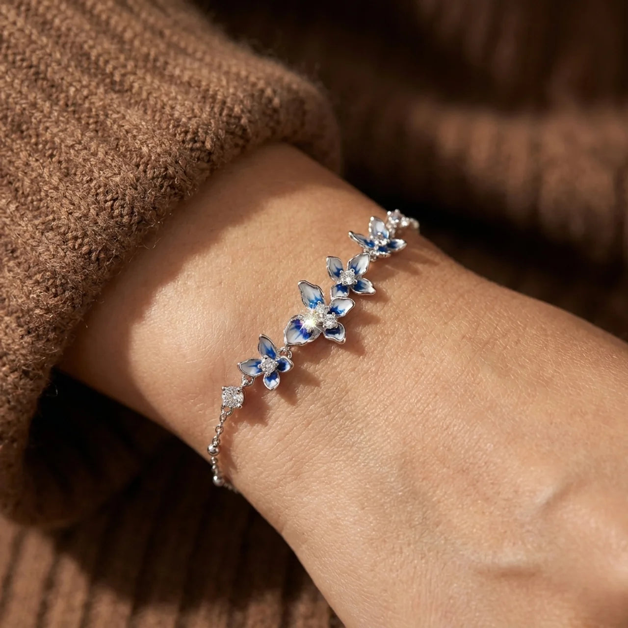 Elegant 925 Silver Bracelet with Blue Flowers and Sparkling Stones