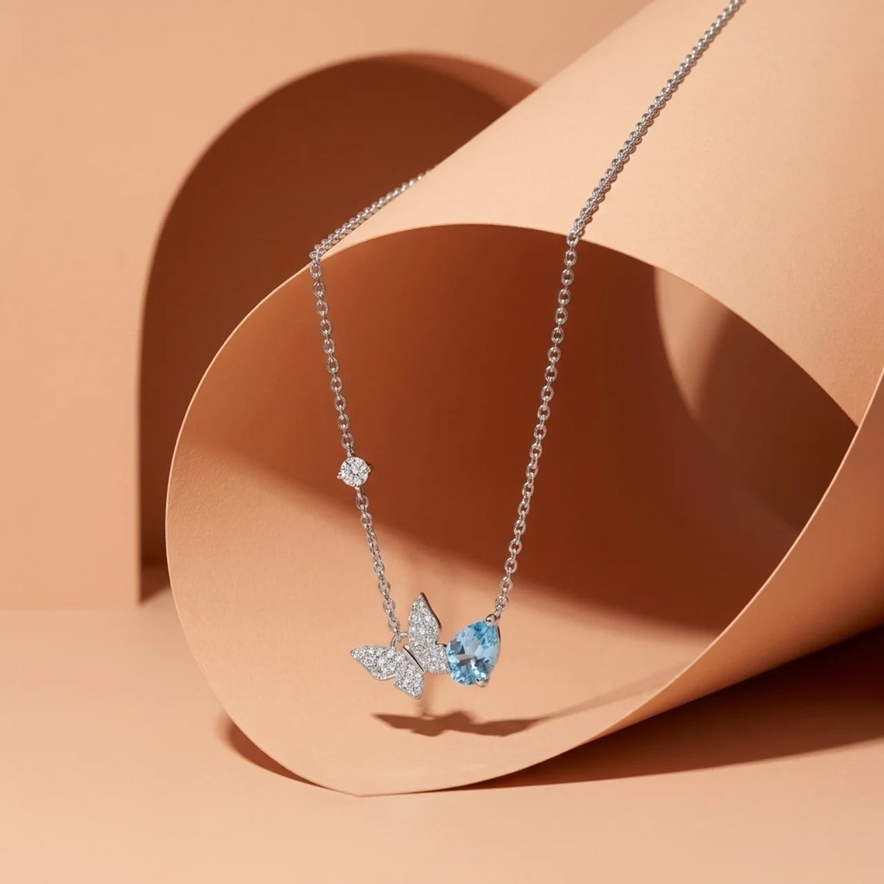 925 Silver Butterfly Necklace with Blue Teardrop Stone Design