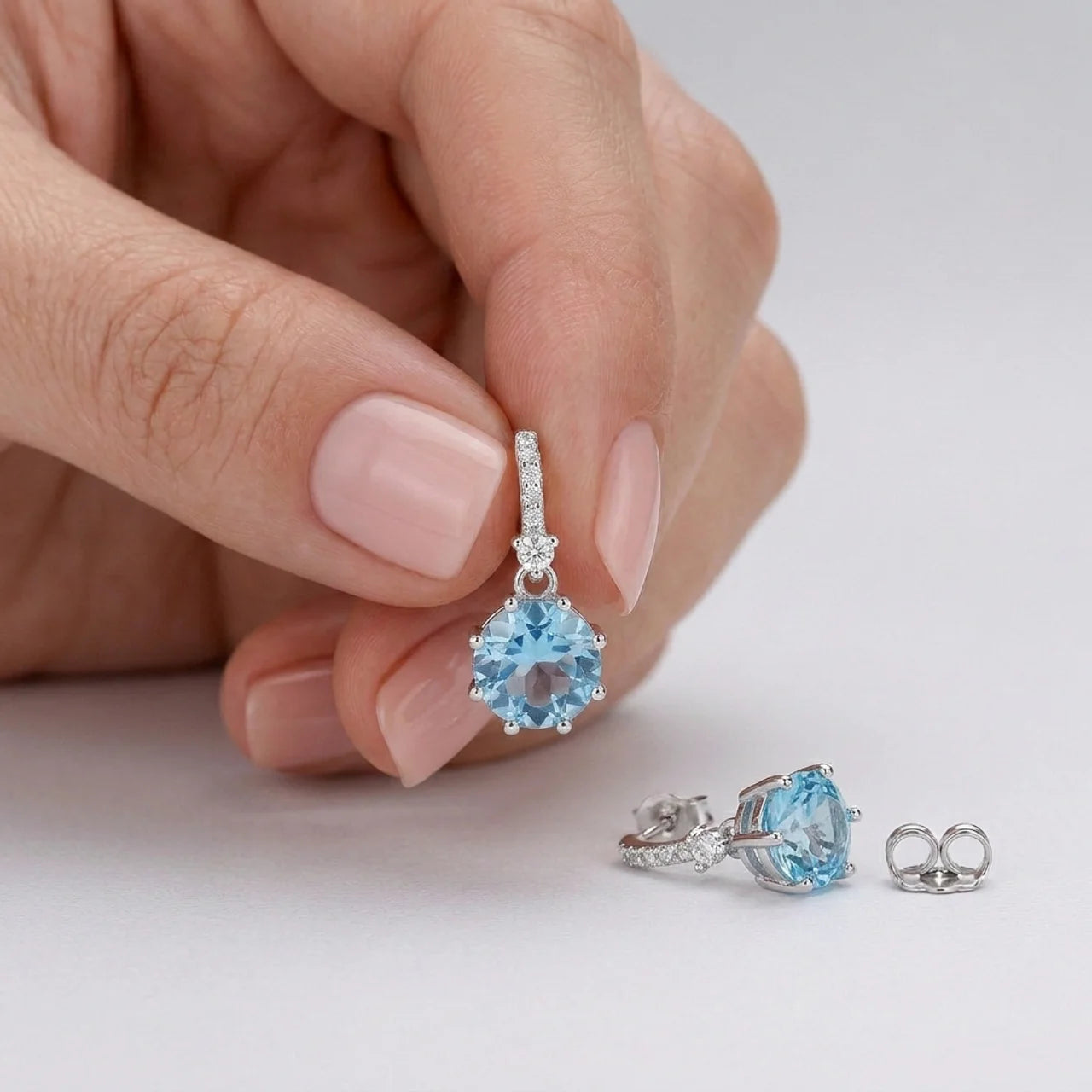 925 Silver Earrings with Sparkling Stones and Rectangular Blue Gem Design