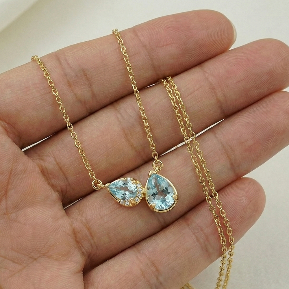 عقد فضة عيار 925 بفص أزرق سماوي مزدوج- مطلي ذهب