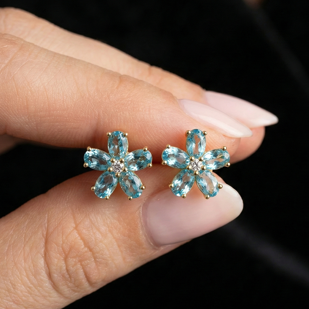 حلق فضة 925 زهرة بفصوص زرقاء مطلي ذهب