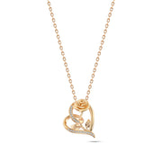 A necklace with a heart and tree branch design, made of 925 sterling silver and studded with zircon stones.